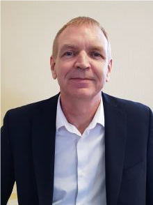 Headshot of Martin Thom, Head of Integration