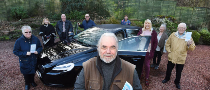 Pictured: Rod McNeill, Chair, with volunteers from Bon'ess Car 4U.