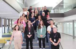 Group photo of staff taking part in mentorships to support students taking part in placements with local health and social care services.